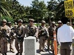 A demonstrator protests near US Marines guarding the Wilshire Federal Building during a rally opposing the US strikes in Iran. (Source: AFP) A demonstrator protests near US Marines guarding the Wilshire Federal Building during a rally opposing the US strikes in Iran. (Source: AFP)