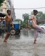 Children play in the rain in Amritsar on Sunday. The southwest monsoon advanced in parts of Punjab on Sunday, while conditions are favourable for its further advancement in parts of Haryana and Chandigarh over the next two days, a senior Met department official said. (Sameer Sehgal/HT) Children play in the rain in Amritsar on Sunday. The southwest monsoon advanced in parts of Punjab on Sunday, while conditions are favourable for its further advancement in parts of Haryana and Chandigarh over the next two days, a senior Met department official said. (Sameer Sehgal/HT)