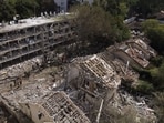 Israeli rescue forces operate at a building that was hit by missiles fired from Iran, in Tel Aviv, Israel, on Sunday, June 22, 2025. Israeli rescue forces operate at a building that was hit by missiles fired from Iran, in Tel Aviv, Israel, on Sunday, June 22, 2025.