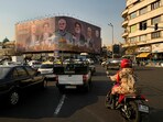 Vehicles drive on Enqelab-e-Eslami (Islamic Revolution) square in Tehran, Iran. Vehicles drive on Enqelab-e-Eslami (Islamic Revolution) square in Tehran, Iran.
