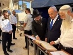 Israeli PM Benjamin Netanyahu thanked God for Israel's safety, connecting recent events to biblical themes during prayers at the Western Wall.