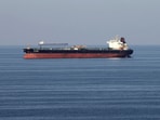 Oil tankers pass through the Strait of Hormuz