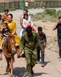 Tourists take a horse ride at Sonamarg in Ganderbal district in Jammu & Kashmir on Sunday. (PTI) Tourists take a horse ride at Sonamarg in Ganderbal district in Jammu & Kashmir on Sunday. (PTI)
