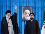 File image: Ayatollah Ruhollah Khomeini's grandson, Hassan Khomeini stands next to Iran's Supreme Leader Ayatollah Ali Khamenei 