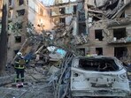 Firefighters work in a destroyed apartment building after a Russian attack in Kyiv, Ukraine, Firefighters work in a destroyed apartment building after a Russian attack in Kyiv, Ukraine,