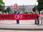 Demonstrators during a protest against war with Iran outside the White House in Washington, DC, US Demonstrators during a protest against war with Iran outside the White House in Washington, DC, US
