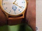 The user shared a photo of himself wearing the uniquely designed watch on X.