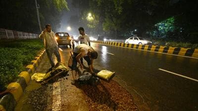 A pothole being repaired on Sardar Patel Marg in New Delhi in 2023. (HT Archive) A pothole being repaired on Sardar Patel Marg in New Delhi in 2023. (HT Archive)