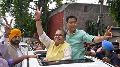 Aam Aadmi Party candidate and Rajya Sabha member Sanjeev Arora (centre) along with AAP Punjab president Aman Arora and cabinet minister Tarunpreet Singh Sond during a victory procession after he won the Ludhiana West assembly seat on Monday. Arora defeated former minister Bharat Bhushan Ashu of the Congress by 10,637 votes. (Gurpreet Singh/HT) Aam Aadmi Party candidate and Rajya Sabha member Sanjeev Arora (centre) along with AAP Punjab president Aman Arora and cabinet minister Tarunpreet Singh Sond during a victory procession after he won the Ludhiana West assembly seat on Monday. Arora defeated former minister Bharat Bhushan Ashu of the Congress by 10,637 votes. (Gurpreet Singh/HT)