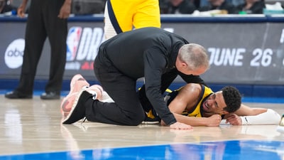 Indiana Pacers guard Tyrese Haliburton (0) reacts after suffering an injury during the first quarter against the Oklahoma City Thunder during game seven of the 2025 NBA Finals at Paycom Center. (IMAGN IMAGES via Reuters Connect)