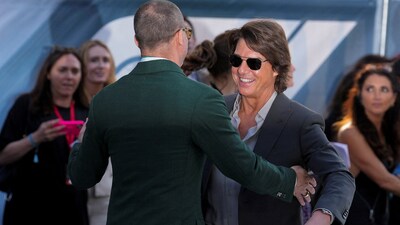 Cast member Brad Pitt and actor Tom Cruise attend the "F1: The Movie" European premiere in London, Britain (REUTERS)