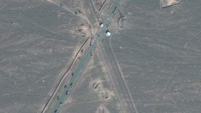 This handout satellite image courtesy of Maxar Technologies shows new vehicle revetments and trucks on road 1.1 km (0.6 miles) from Iran's Fordow Fuel Enrichment Plant (FFEP), in Fordo, Iran on June 20, 2025. (AFP) This handout satellite image courtesy of Maxar Technologies shows new vehicle revetments and trucks on road 1.1 km (0.6 miles) from Iran's Fordow Fuel Enrichment Plant (FFEP), in Fordo, Iran on June 20, 2025. (AFP)