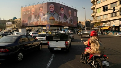 Vehicles drive on Enqelab-e-Eslami (Islamic Revolution) square in Tehran, Iran. (For representation/AP) Vehicles drive on Enqelab-e-Eslami (Islamic Revolution) square in Tehran, Iran. (For representation/AP)
