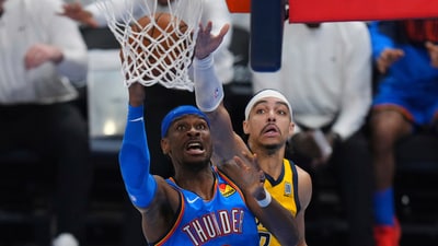 Oklahoma City Thunder guard Shai Gilgeous-Alexander, left, shoots against Indiana Pacers guard Andrew Nembhard during the second half of Game 7 of the NBA Finals basketball series Sunday, June 22, 2025, in Oklahoma City. (AP)