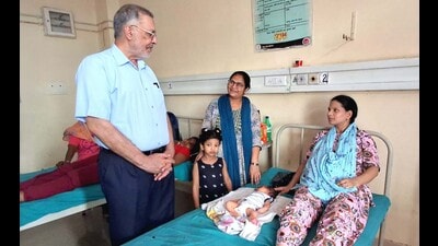 Punjab health minister Balbir Singh interacting with patients in Ludhiana on Monday. (HT Photo)