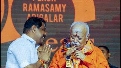 RSS chief Mohan Bhagwat with Tamil Nadu BJP president Nainar Nagendran during the centenary celebrations of RSS and Ramasamy Adigalar, at Perur in Coimbatore on Monday (PTI) RSS chief Mohan Bhagwat with Tamil Nadu BJP president Nainar Nagendran during the centenary celebrations of RSS and Ramasamy Adigalar, at Perur in Coimbatore on Monday (PTI)