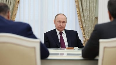Russia's President Vladimir Putin meets with Iranian foreign minister at the Kremlin in Moscow. (AFP)