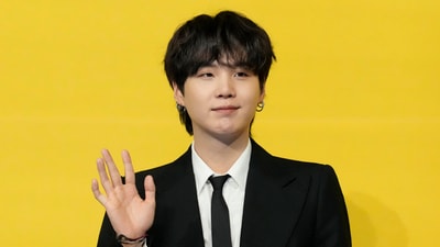 Suga, who joined the social service in December 2023, officially completed his service last week. (AP) Suga, who joined the social service in December 2023, officially completed his service last week. (AP)