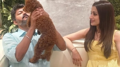 Trisha Krishnan couldn't keep her eyes off Vijay as he played with her dog, Izzy. Trisha Krishnan couldn't keep her eyes off Vijay as he played with her dog, Izzy.