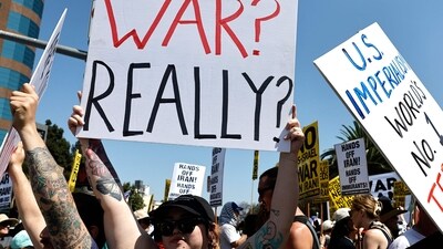 In Los Angeles, demonstrators gathered outside the Wilshire Federal Building during a rally opposing the United States' strikes on Iran on June 22, 2025 in Los Angeles, California. Similar protests were also seen in other cities in the US after President Donald Trump authorised the strikes. (Getty Images via AFP) In Los Angeles, demonstrators gathered outside the Wilshire Federal Building during a rally opposing the United States' strikes on Iran on June 22, 2025 in Los Angeles, California. Similar protests were also seen in other cities in the US after President Donald Trump authorised the strikes. (Getty Images via AFP)