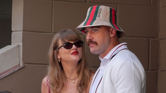 US musician Taylor Swift (L) and US NFL football player Travis Kelce (R) attend the men's final match between Italy's Jannik Sinner and USA's Taylor Fritz in New York City. (Photo by TIMOTHY A. CLARY / AFP) (AFP)