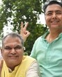 AAP candidate Sanjeev Arora along with party president Aman Arora during a victory march in Ludhiana on Monday. (Gurpreet Singh/HT)