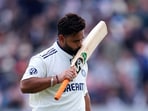 Rishabh Pant celebrates after he scored his second century of the Test match, with 118 in the third innings. It proved to be a truly historic feat,