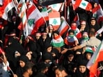 Iraqis wave the flags of Iran and Lebanon and chant slogans as they march in the Kadhimiya district of Baghdad on June 21, 2025, to protest against Israel's strikes on Iran. Iraqis wave the flags of Iran and Lebanon and chant slogans as they march in the Kadhimiya district of Baghdad on June 21, 2025, to protest against Israel's strikes on Iran.