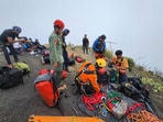 In this undated photo released by the Indonesian National Search and Rescue Agency on Tuesday, June 24, 2025, rescuers prepare for the evacuation operation for Juliana Marins, a Brazilian tourist who fell off the ridge of Mount Rinjani while hiking near the volcano's summit, in Lombok, Indonesia. In this undated photo released by the Indonesian National Search and Rescue Agency on Tuesday, June 24, 2025, rescuers prepare for the evacuation operation for Juliana Marins, a Brazilian tourist who fell off the ridge of Mount Rinjani while hiking near the volcano's summit, in Lombok, Indonesia.