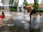 A severe heat wave is affecting nearly 160 million people in the eastern U.S., with temperatures reaching 104°F in New York. (Photo by SPENCER PLATT / GETTY IMAGES NORTH AMERICA / Getty Images via AFP)