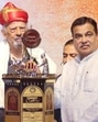 Union Minister Nitin Gadkari and Padma Vibhushan professor MM Sharma felicitated economist Vijay Kelkar (centre) with the Punyabhushan Award 2025 in Pune on Monday. (HT) Union Minister Nitin Gadkari and Padma Vibhushan professor MM Sharma felicitated economist Vijay Kelkar (centre) with the Punyabhushan Award 2025 in Pune on Monday. (HT)