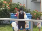 Internet users criticised a father who used a blue recycling bin for disciplining his son, calling it poor parenting. Internet users criticised a father who used a blue recycling bin for disciplining his son, calling it poor parenting.