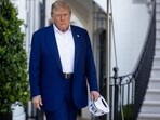 US President Donald Trump walks on the South Lawn of the White House before boarding Marine One in Washington, DC on Tuesday, June 24 US President Donald Trump walks on the South Lawn of the White House before boarding Marine One in Washington, DC on Tuesday, June 24