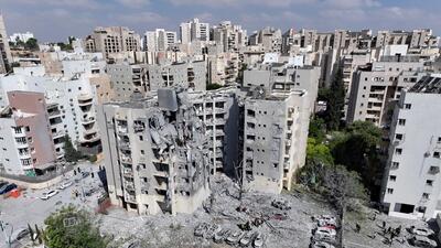 A drone view shows an impacted residential site, following an early morning missile attack from Iran on Israel, in Be'er Sheva in Israel on June 24. (REUTERS) A drone view shows an impacted residential site, following an early morning missile attack from Iran on Israel, in Be'er Sheva in Israel on June 24. (REUTERS)