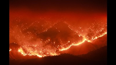 Embers glow at night as the Basin Fire burns in the Sierra National Forest in Fresno County, California, on June 26, 2024. (AFP) Embers glow at night as the Basin Fire burns in the Sierra National Forest in Fresno County, California, on June 26, 2024. (AFP)