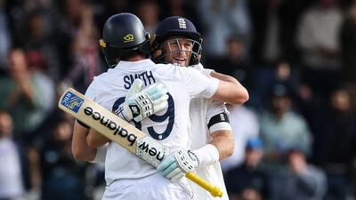 England's Joe Root hugs wicketkeeper Jamie Smith after beating India in first Test. (AFP) England's Joe Root hugs wicketkeeper Jamie Smith after beating India in first Test. (AFP)