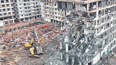 Thane, India - June -24, 2025: Thane Municipal corporation took action Tuesday at Shill area khan compound Mumbra on the building ordered by the court. The work of demolishing the partially demolished building started on Tuesday. ,in Thane,in Mumbai, India, on, Tuesday, June -24, 2025. ( Praful Gangurde / HT Photo ) Thane, India - June -24, 2025: Thane Municipal corporation took action Tuesday at Shill area khan compound Mumbra on the building ordered by the court. The work of demolishing the partially demolished building started on Tuesday. ,in Thane,in Mumbai, India, on, Tuesday, June -24, 2025. ( Praful Gangurde / HT Photo )
