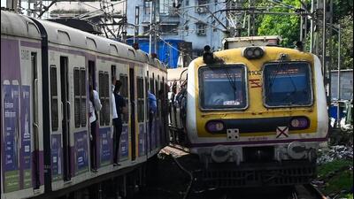 Thane, India. June 10, 2025: Local trains cross near section at Mumbra Railway Station, where four commuters lost their lives and nine others were injured on June 9, 2025, in Thane, India. The incident occurred when the commuters fell from a train heading to Chhatrapati Shivaji Maharaj Terminus. Thane India. June 10, 2025. (Photo by Raju Shinde/HT Photo) (Hindustan Times) Thane, India. June 10, 2025: Local trains cross near section at Mumbra Railway Station, where four commuters lost their lives and nine others were injured on June 9, 2025, in Thane, India. The incident occurred when the commuters fell from a train heading to Chhatrapati Shivaji Maharaj Terminus. Thane India. June 10, 2025. (Photo by Raju Shinde/HT Photo) (Hindustan Times)