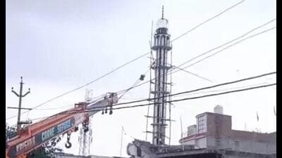 The drive to demolish Raza-e-Mustafa Masjid underway in the Chandausi town of Sambhal district on Tuesday. (HT Photo)
