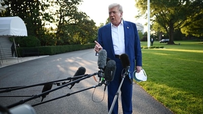 US President Donald Trump speaks to the press before boarding Marine One from the South Lawn of the White House in Washington, DC. (AFP) US President Donald Trump speaks to the press before boarding Marine One from the South Lawn of the White House in Washington, DC. (AFP)