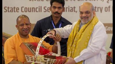 Union home minister Amit Shah with UP chief minister Yogi Adityanath during the 25th meeting of the Central Zonal Council, in Varanasi, Tuesday. (PTI Photo)