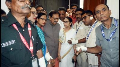West Bengal chief minister Mamata Banerjee meets the assembly marshals allegedly injured during a scuffle with BJP legislators during the monsoon session in Kolkata on Tuesday. (ANI) West Bengal chief minister Mamata Banerjee meets the assembly marshals allegedly injured during a scuffle with BJP legislators during the monsoon session in Kolkata on Tuesday. (ANI)