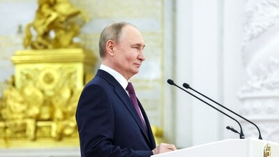 In this pool photograph distributed by the Russian state agency Sputnik, Russia's President Vladimir Putin gives a speech during a meeting (AFP)