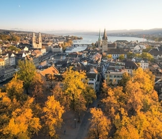 Golden Hour - Fall foliage paints the city in warm hues.