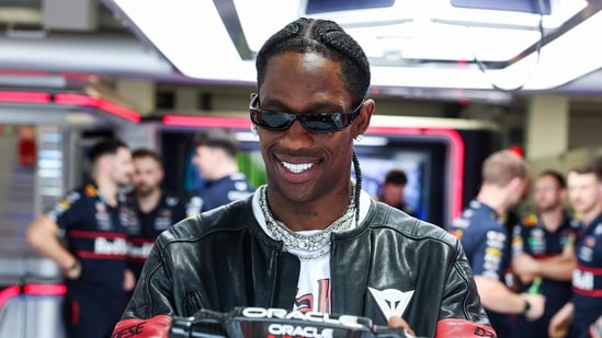 MIAMI, FLORIDA - MAY 03: Travis Scott visits the Oracle Red Bull Racing garage during qualifying ahead of the F1 Grand Prix of Miami at Miami International Autodrome on May 03, 2025 in Miami, Florida. Mark Thompson/Getty Images/AFP (Photo by Mark Thompson / GETTY IMAGES NORTH AMERICA / Getty Images via AFP) (Getty Images via AFP)