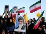 Iranian protesters hold their country's flags and posters of Supreme Leader Ayatollah Ali Khamenei in an anti-U.S. and anti-Israeli rally at Enqelab-e-Eslami (Islamic Revolution) square in downtown Tehran, Iran, Tuesday, June 24, 2025. Iranian protesters hold their country's flags and posters of Supreme Leader Ayatollah Ali Khamenei in an anti-U.S. and anti-Israeli rally at Enqelab-e-Eslami (Islamic Revolution) square in downtown Tehran, Iran, Tuesday, June 24, 2025.