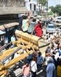 BJP workers on a JCB block the route of an SP delegation in Gorakhpur on Wednesday (HT Photo) BJP workers on a JCB block the route of an SP delegation in Gorakhpur on Wednesday (HT Photo)
