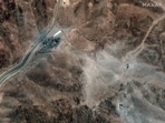 This handout satellite picture provided by Maxar Technologies shows new airstrike craters at perimeter installation on Iran's Fordow Fuel Enrichment Plant (FFEP) after US strikes. This handout satellite picture provided by Maxar Technologies shows new airstrike craters at perimeter installation on Iran's Fordow Fuel Enrichment Plant (FFEP) after US strikes.