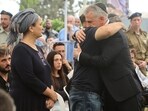 Mossad Director David Barnea greets relatives of Israeli soldier Zvi Feldman, one of three Israeli soldiers who went missing during the 1982 battle of Sultan Yacoub against Syrian forces in eastern Lebanon, during his funeral.