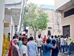 Locals gathered as Firefighters try to douse a fire that broke out in a factory, at Rithala, in New Delhi, India, on Wednesday, June 25, 2025. Locals gathered as Firefighters try to douse a fire that broke out in a factory, at Rithala, in New Delhi, India, on Wednesday, June 25, 2025.